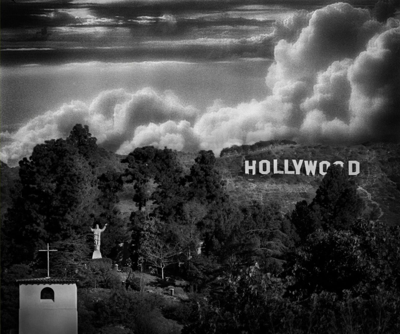 A black and white photo of the hollywood sign.