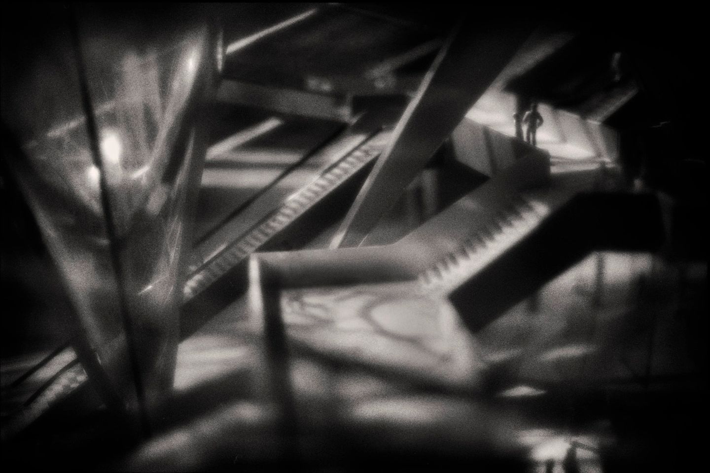 A black and white photo of some piano keys