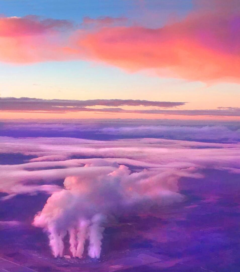 A painting of the sky with clouds and purple colors