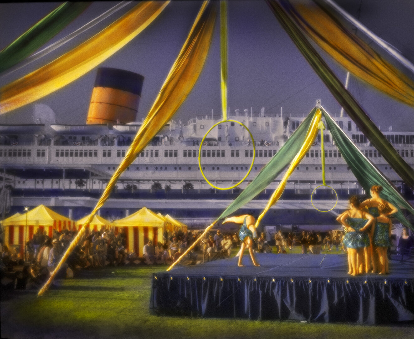 A large ship with yellow and green decorations.